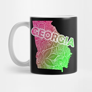 Colorful mandala art map of Georgia with text in pink and green Mug